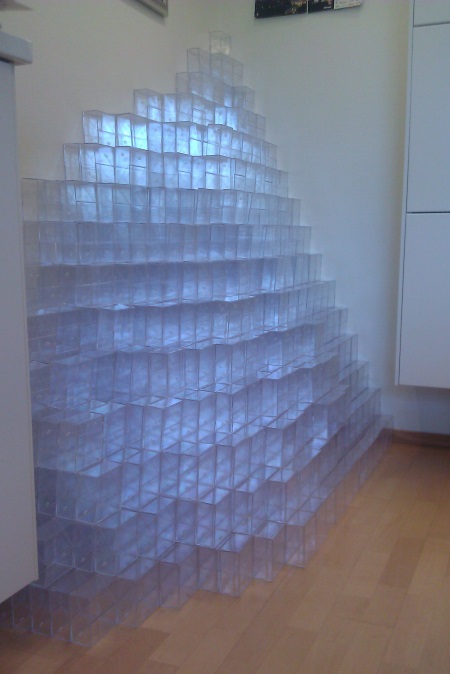 Art installation "Resistance to Change" in my office made from empty floppy containers.